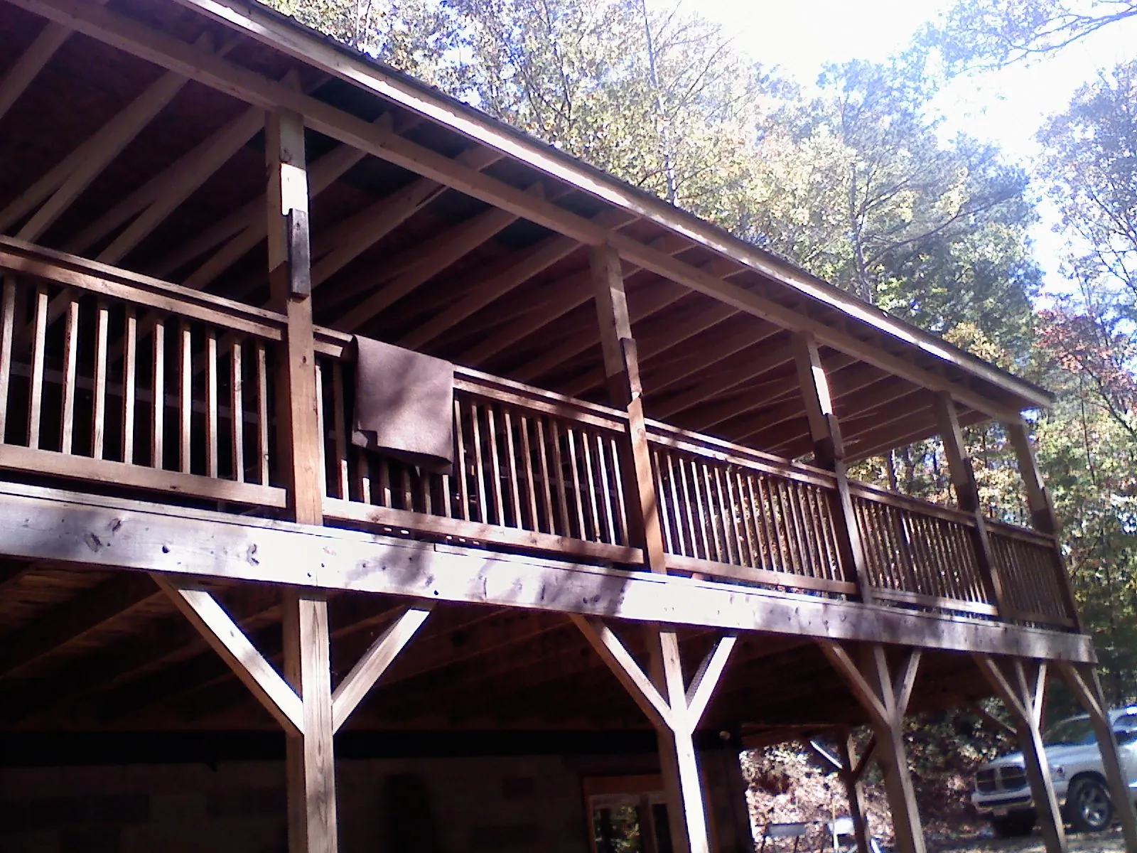 Timber framing under a new elevated porch and deck — Roof Leak Repair in New Roads by Roofing Brothers